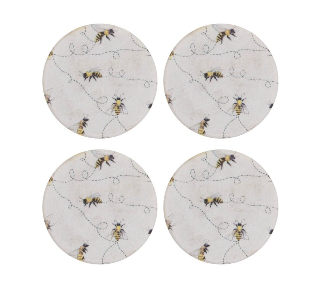 4 round coasters of white finish featuring flying bumble bee illustrations. Situated on a white studio background