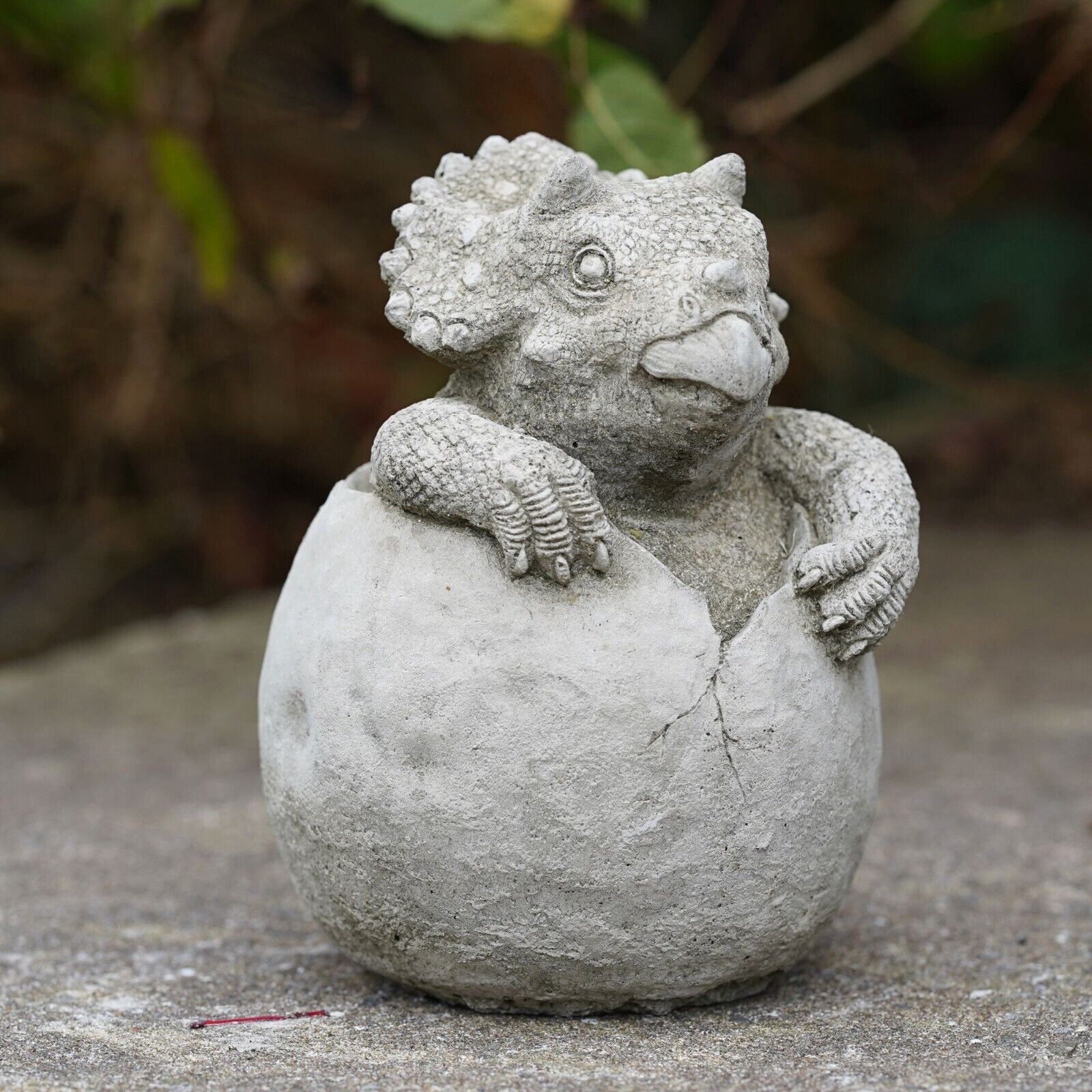 Dinosaur in Egg Triceratops Stone Statue