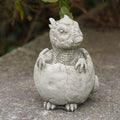 Dinosaur in Egg Stone Statue