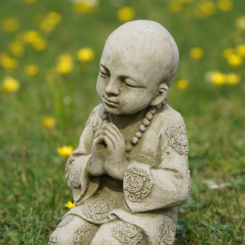 Praying Monk Stone Statue