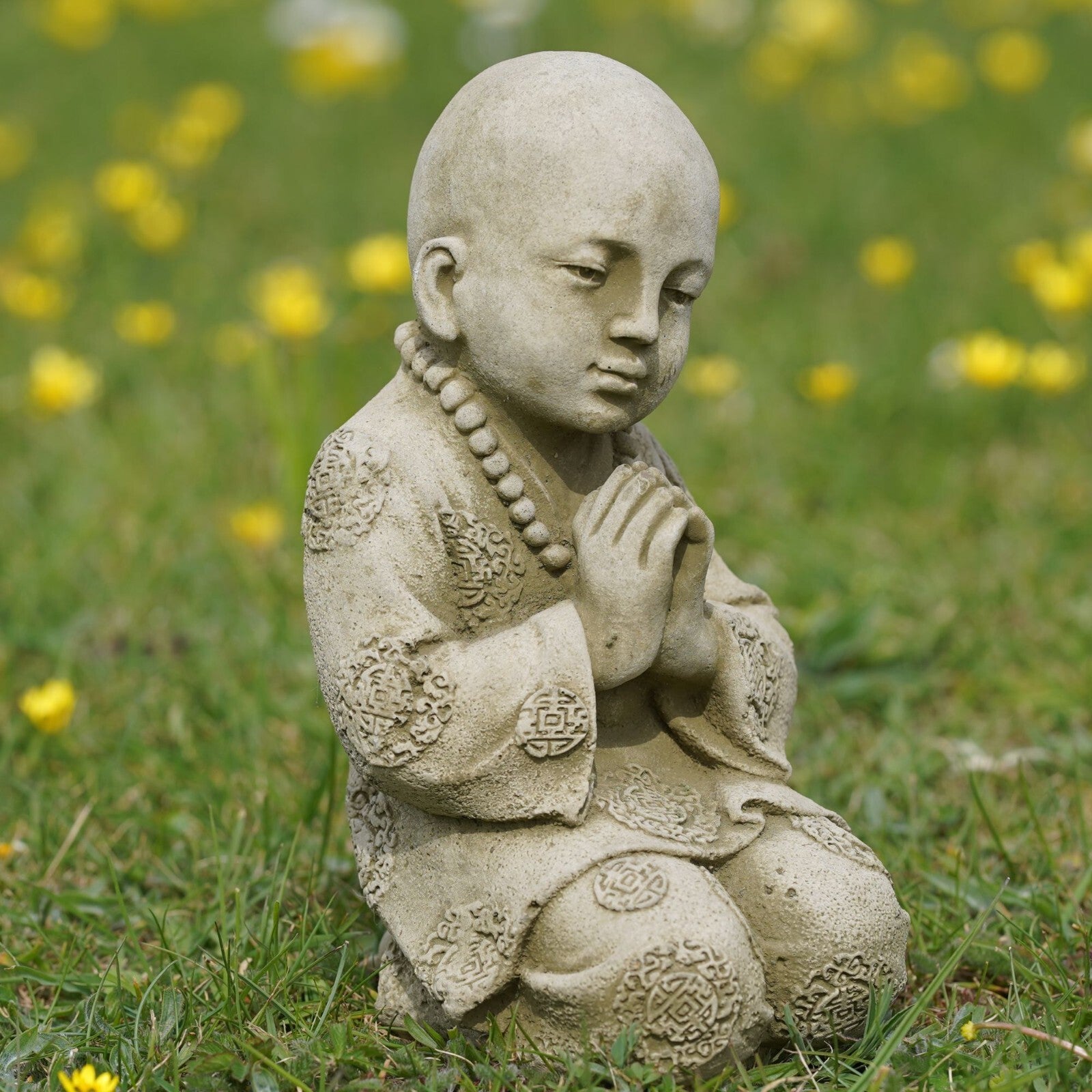 Praying Monk Stone Statue