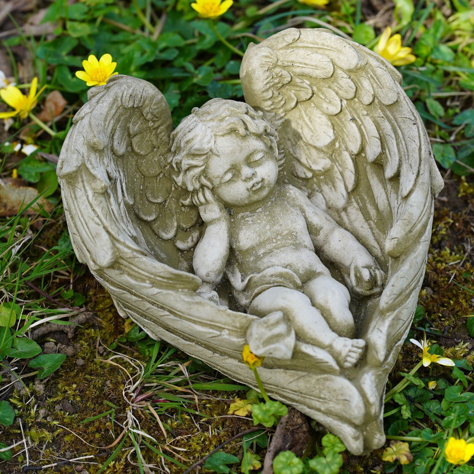 Serene Cherub Stone Statue