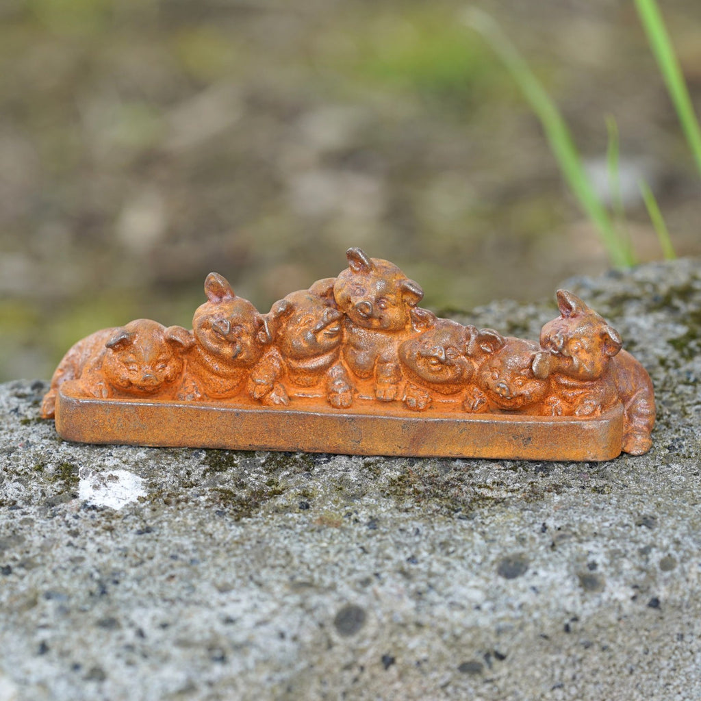 Cast Iron Pigs at Trough