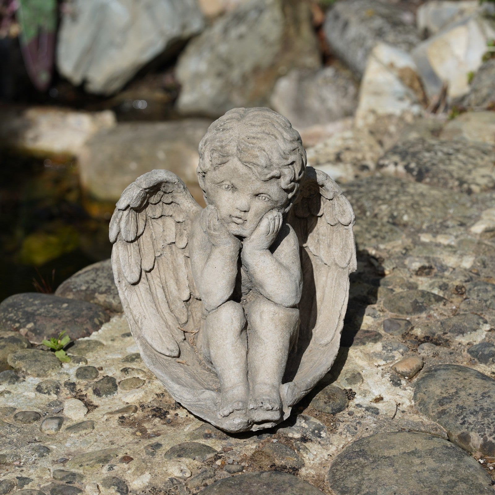 Thoughtful Cherub Stone Statue Outdoor Garden Ornament