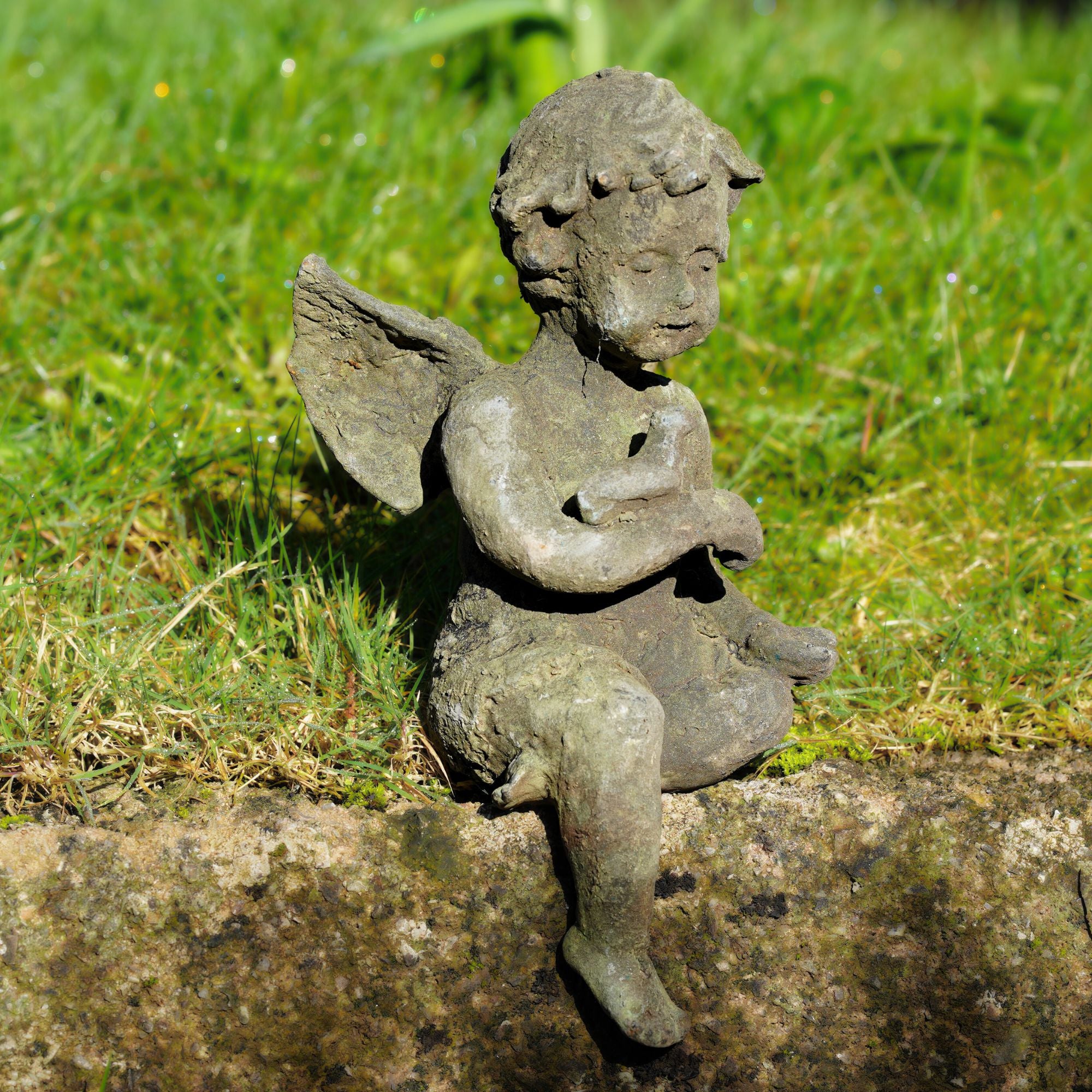 Cast Iron Sitting Cherub